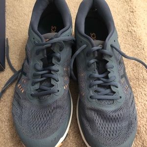Women’s 8.5 ASICS running shoes.
